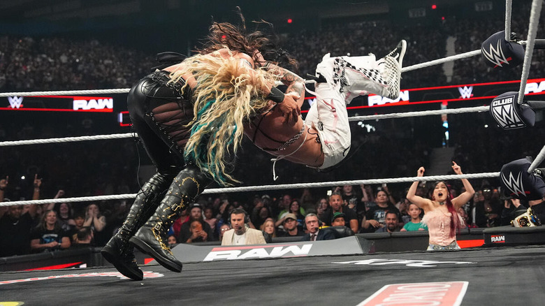 Sol Ruca hits the Sol Snatcher on Raquel Rodriguez as IYO SKY looks on on "WWE Raw"