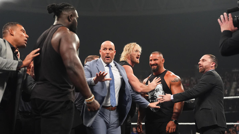 Oba Femi and Bron Breakker being separated by Adam Pearce and other officials on "WWE Raw"