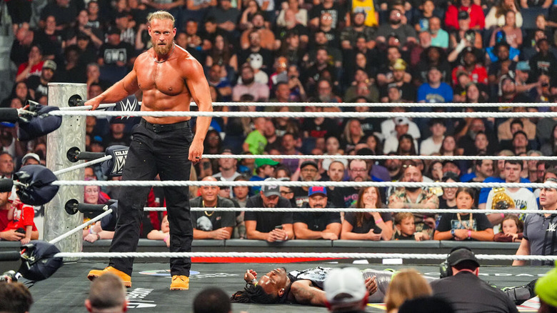 Big Cass stands over a fallen Je'Von Evans in the ring on "WWE Raw"