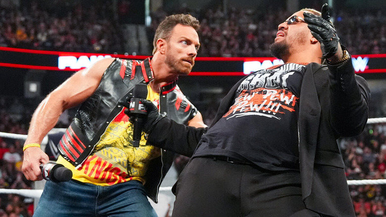 LA Knight and Solo Sikoa pose in the ring on "WWE Raw"