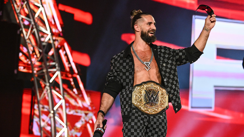 Seth Rollins taunts CM Punk from the entry way