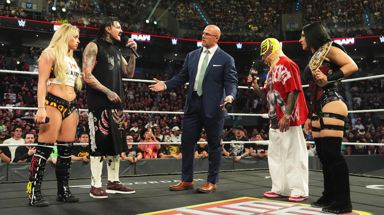 Liv Morgan, Dominik Mysterio, Adam Pearce, Rey Mysterio and Stephanie Vaquer in the ring on "WWE Raw"