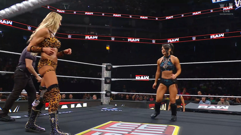 Flair and Valkyria staring down one another