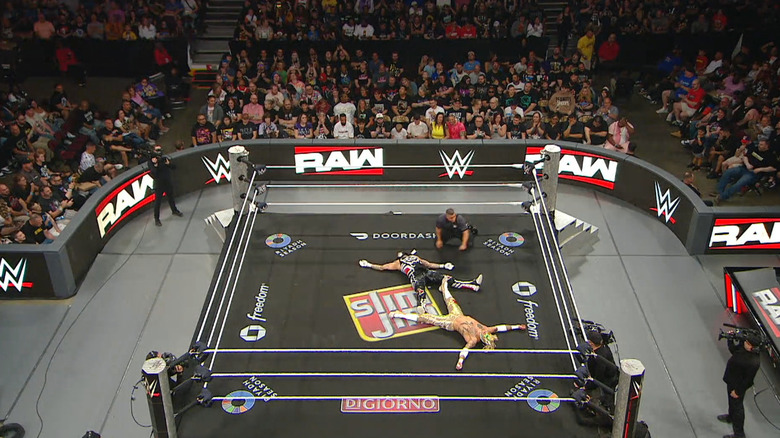 Penta and Fenix both down inside the ring