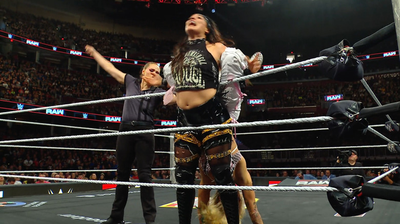 Ruca with Rodriguez tangled up in the ropes