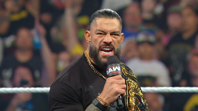 Reigns talking in the ring