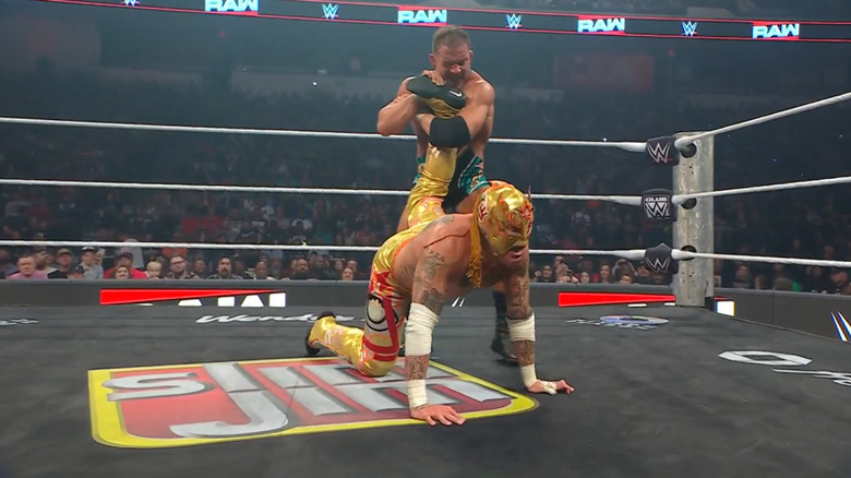Chad Gable locks Rey Fenix in the ankle lock