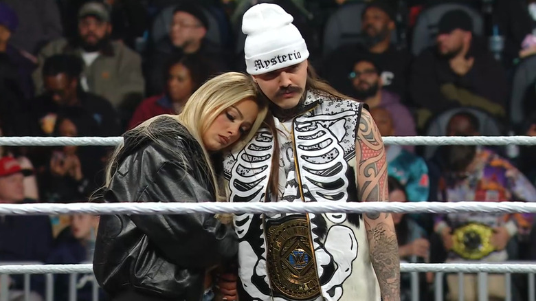 Morgan and Dominik cuddled up in the ring