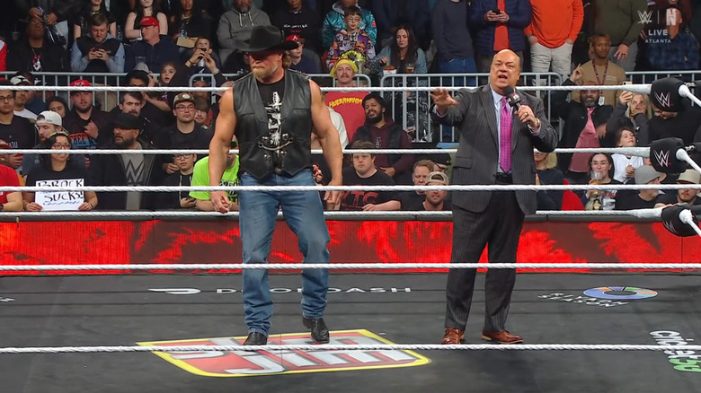 Lesnar and Heyman in the ring