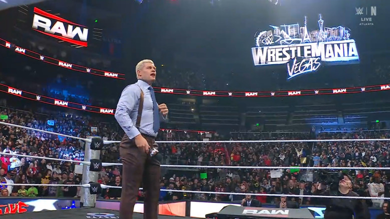 Rhodes standing in the ring