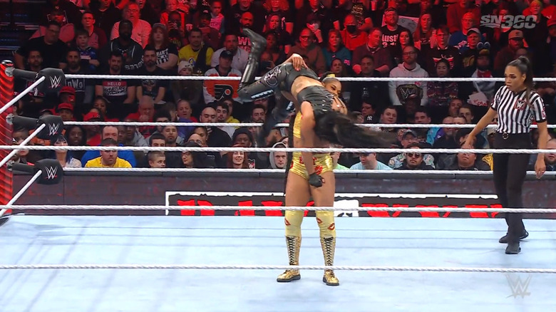 Belair delivering a bodyslam