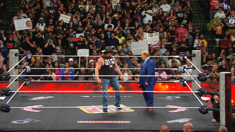 Lesnar and Heyman inside the ring