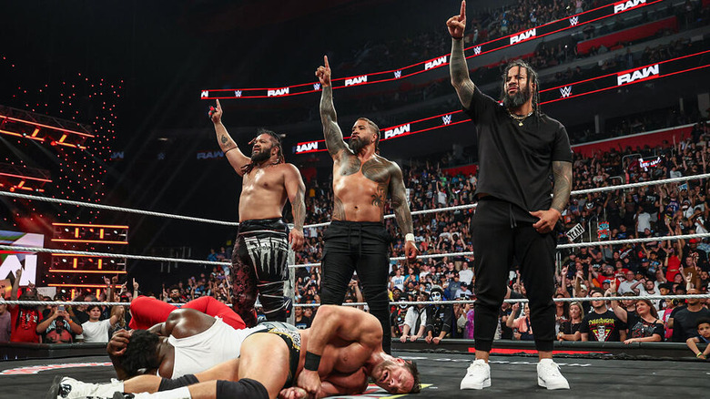 The Bloodline stand tall in the ring on "WWE Raw"