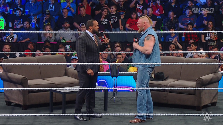 Lesnar and MVP on the VIP Lounge set, talking