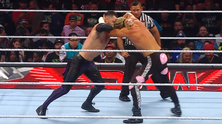Balor and Ziggler lock up