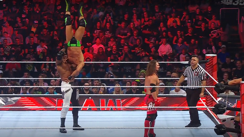 Lashley holding Ciampa in a delayed vertical suplex