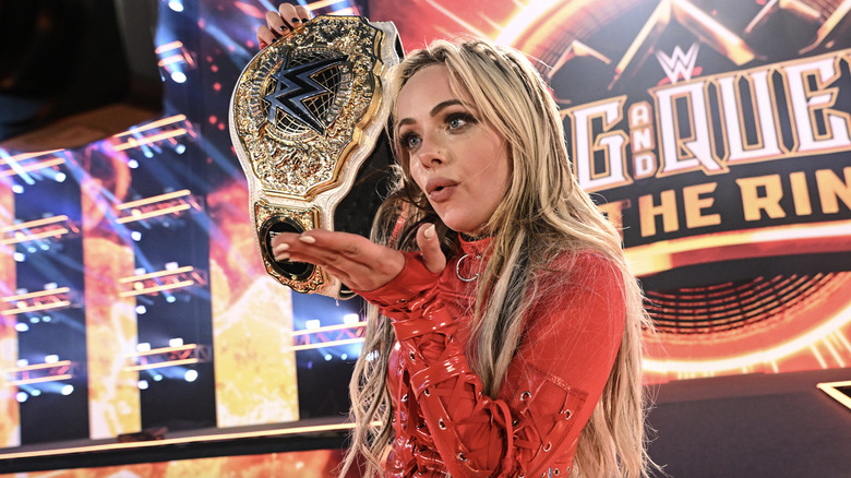 Morgan holding up her title