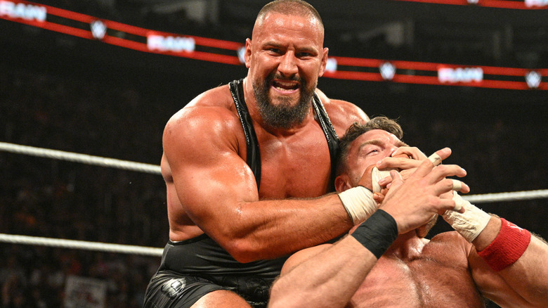 Bron Breakker locks in a chin lock