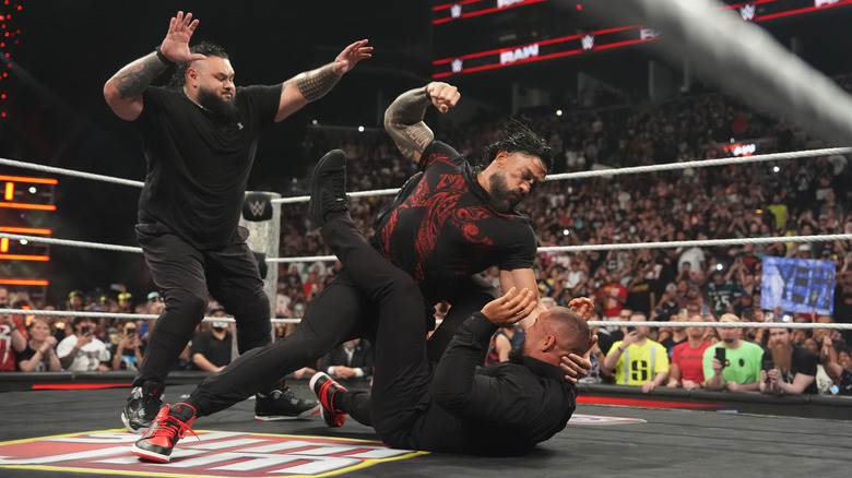 Roman Reigns attacks Bron Breakker