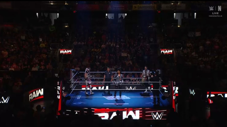 Penta and Dominik in the ring during the ring announcement