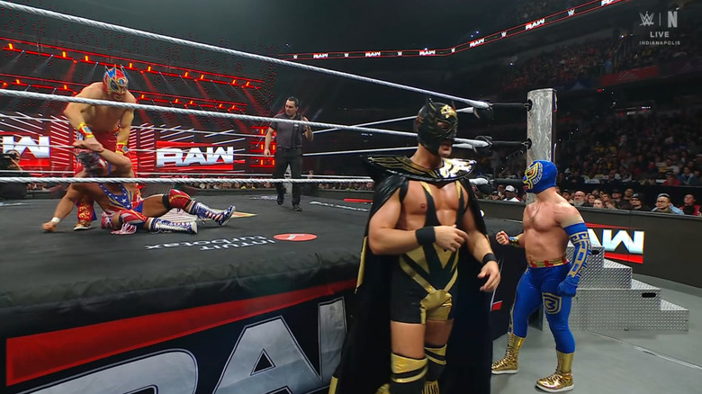 Rayo and OG Grande in the ring as Bravo Americano and El Grande Americano watch from the outside