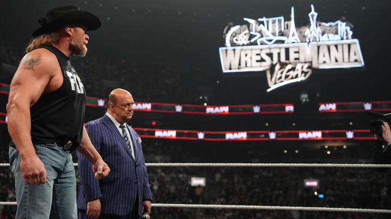 Brock Lesnar looks at the WrestleMania sign on "WWE Raw"