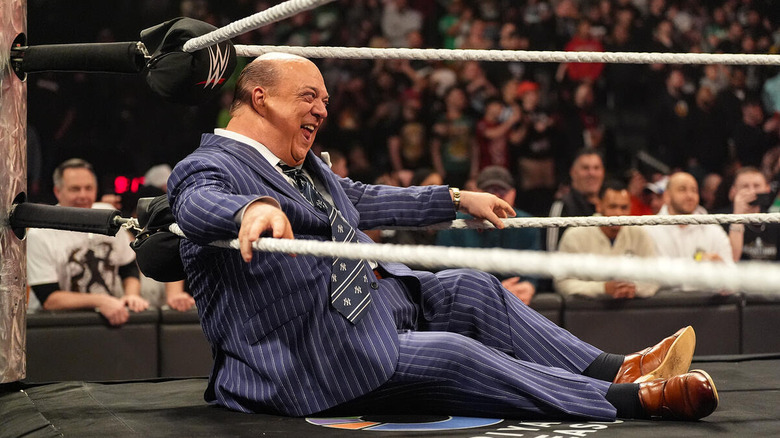 Paul Heyman laughs while sitting in the corner of the ring on "WWE Raw"
