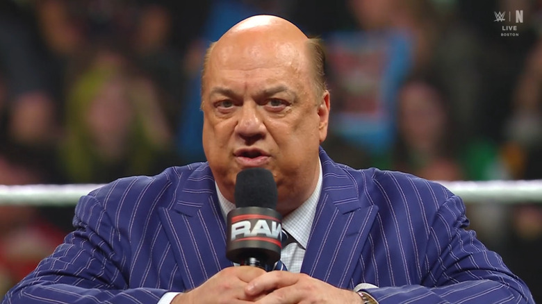 Heyman talking in the ring