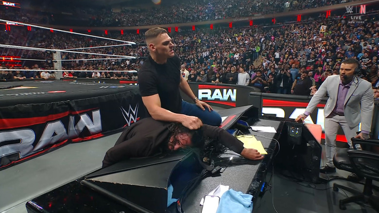 GUNTHER and Rollins at ringside