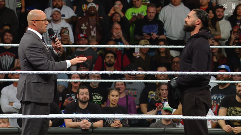 Pearce and Rollins staring one another down in the ring
