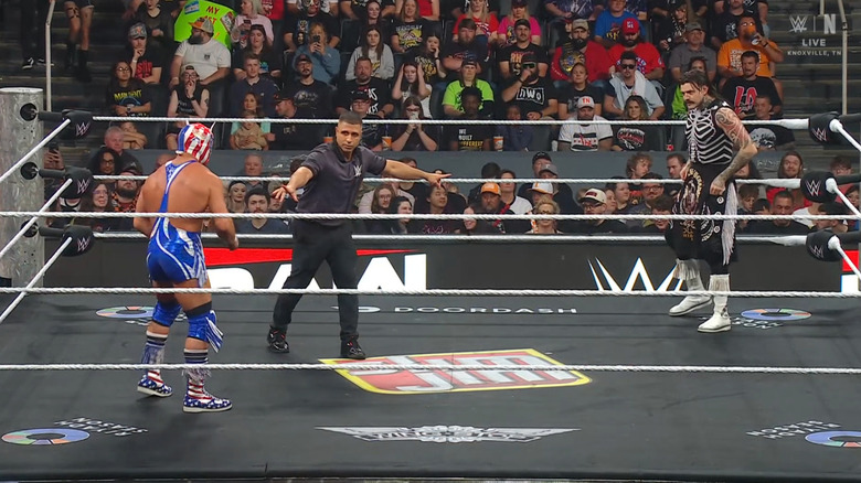 OG Grande and Dominik staring down one another in the ring