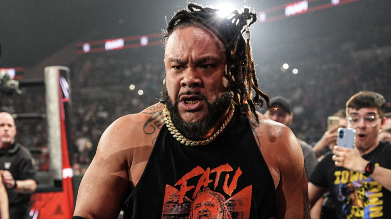 Fatu in the ringside area