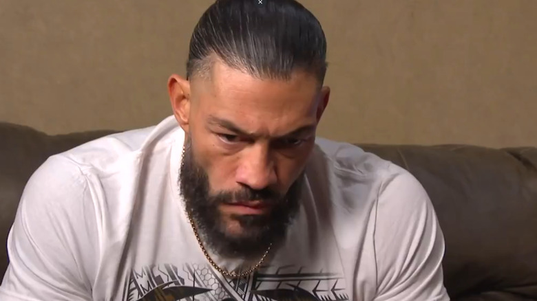 Roman Reigns looking contemplative