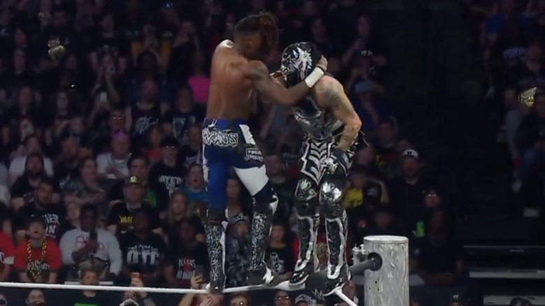 Evans and Penta on the top rope