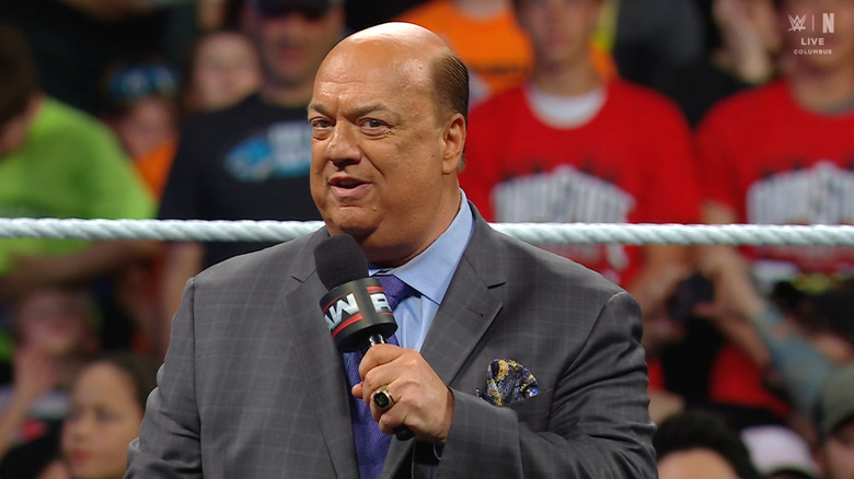 Heyman talking in the ring