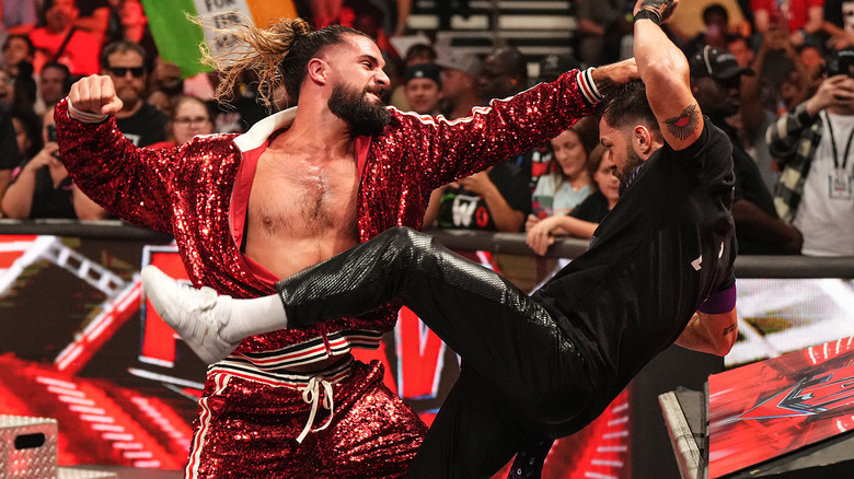 Seth Rollins punches Finn Balor on the June 26 "Raw"