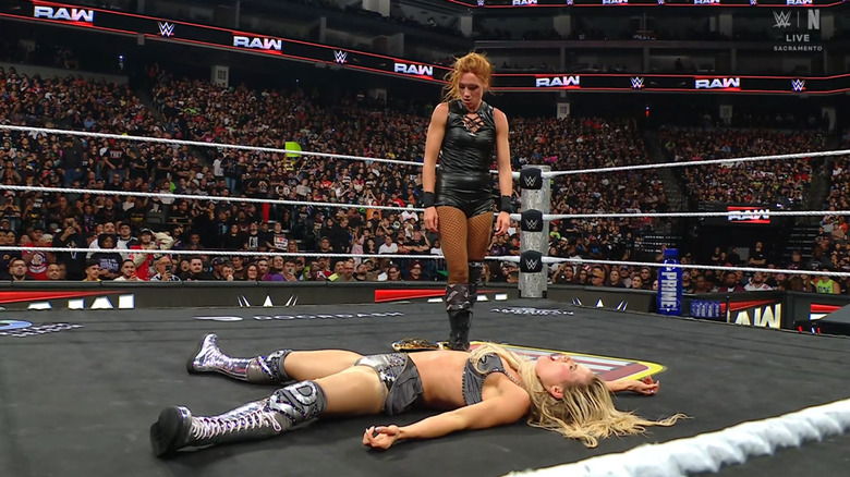 Lynch standing over Dupri