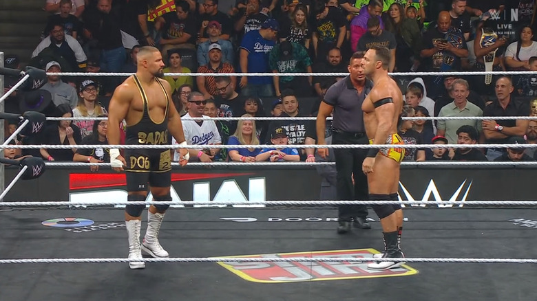 Breakker and Knight staring one another down