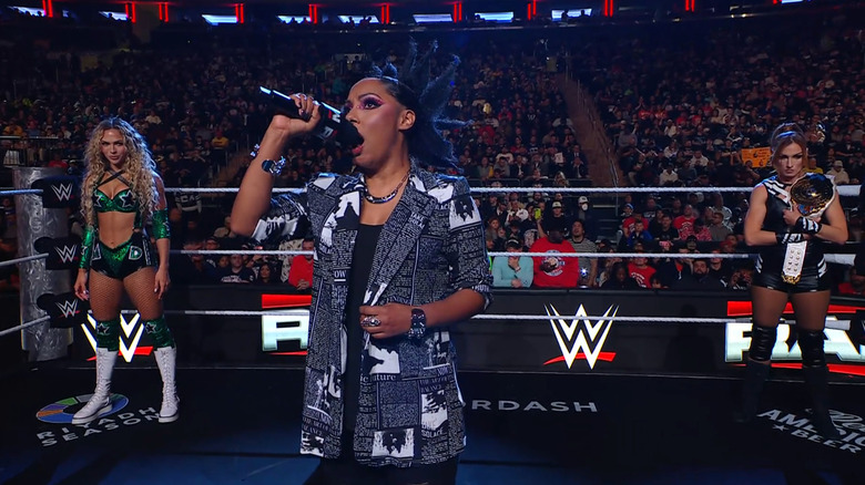 Dupri and Lynch in the ring during the ring announcement