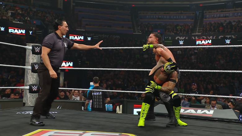 McDonagh wearing down Rey with a submission hold