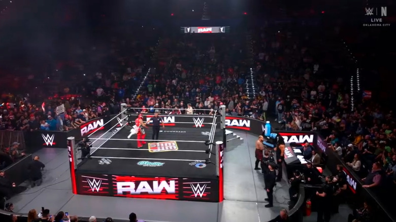 Penta in the ring as Sikoa and Talla stand on the outside