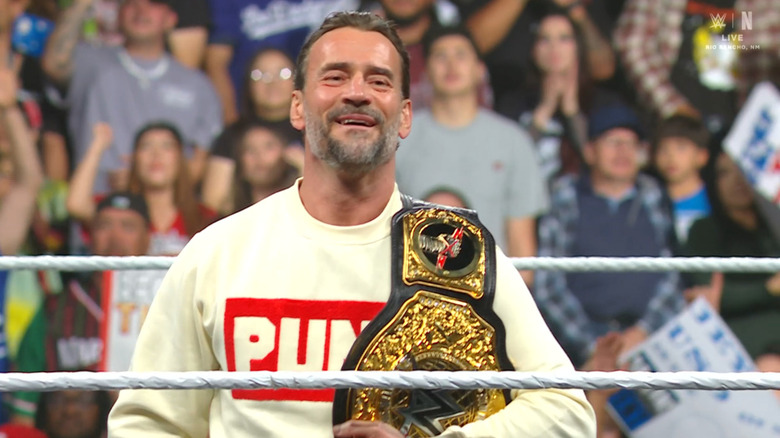Punk in the ring with his World Heavyweight Championship belt