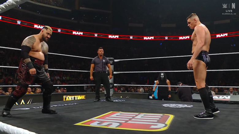 Sikoa and GUNTHER staring one another down in the ring