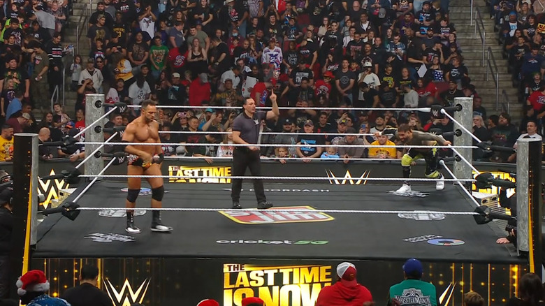 Knight and Jey staring each other down in the ring