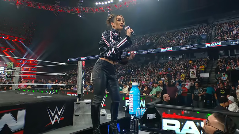 Nikki standing on the announce desk