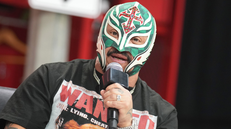 Rey speaking at an event