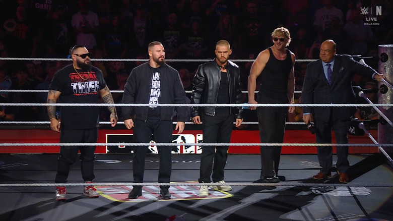 The Vision all standing in the ring