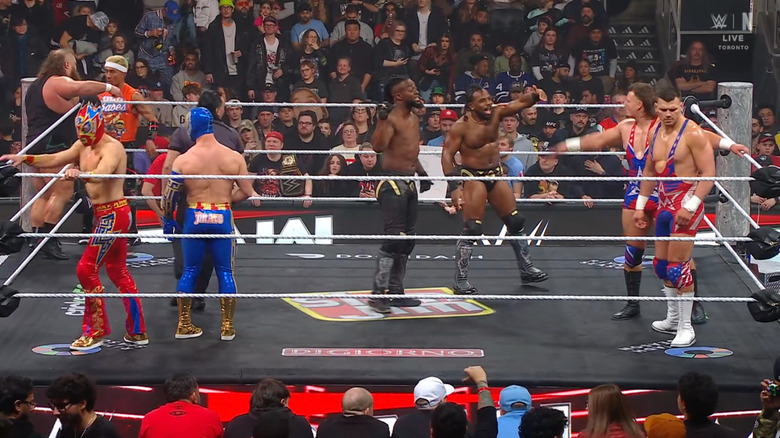 All eight men in the ring