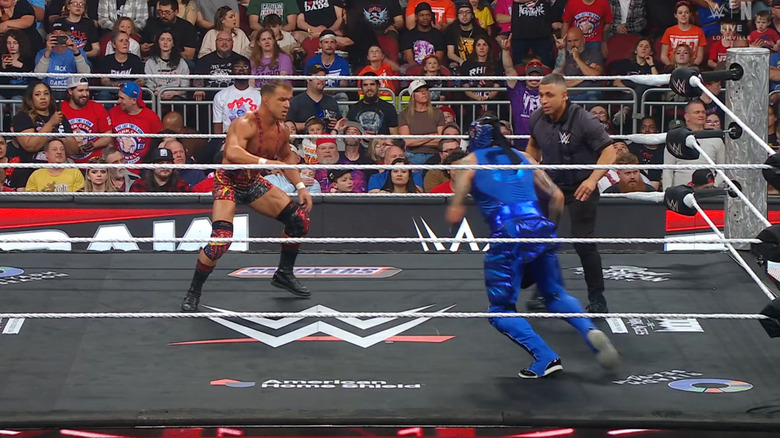 Gable and Penta staring each other down in the ring