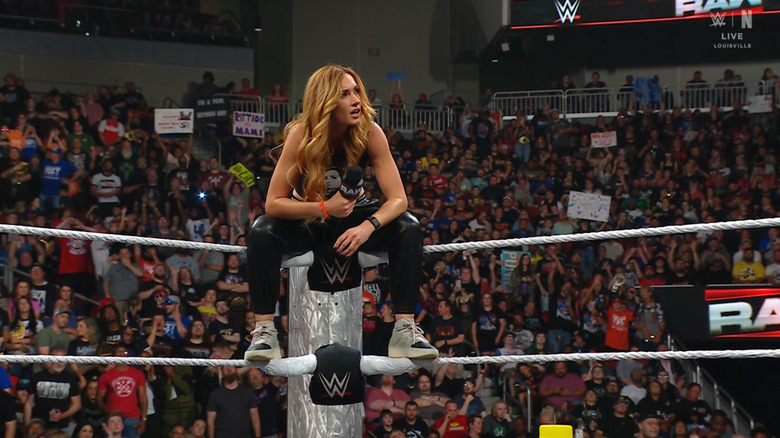 Lynch sitting on the ropes